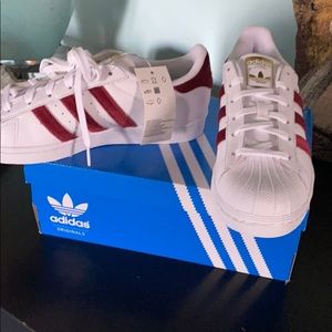 Never worn- maroon adidas superstars